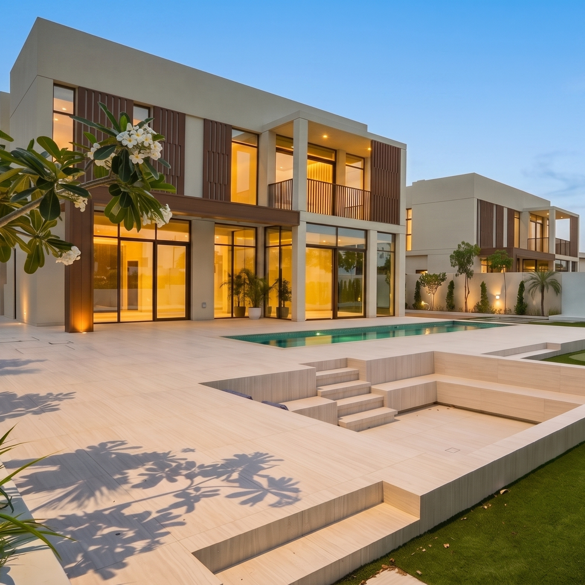 Absher Landscaping villa project with pool at twilight